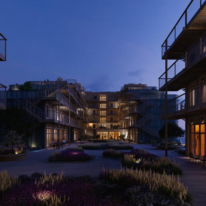 Däcket med entrébalkonger i trä skapar ett naturligt och ombonad väderskydd framför de publika lokalernas utomhusytor.